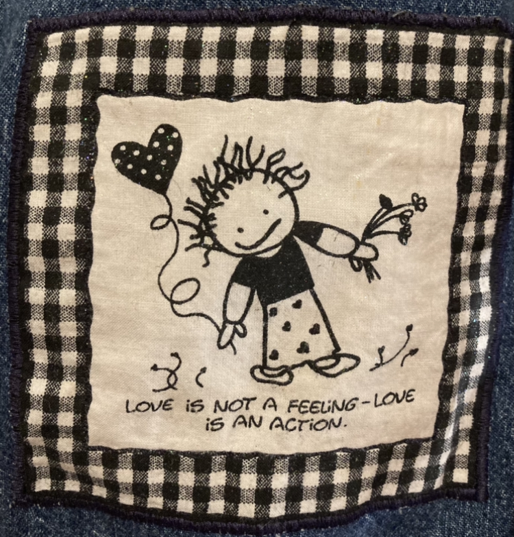 Patch reading Love is not a feeling- Love is an action
